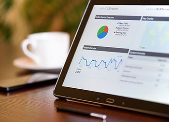 SEO services - site analysis metrics on tablet screen